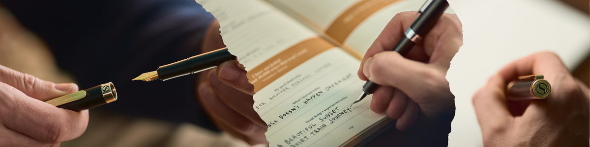 close-up of fountain pen with nib, writing in a notebook for the fountain pen guide